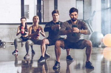 Chiropractic-Charlotte-NC-Group-Of-Four-Adults-Exercising.webp